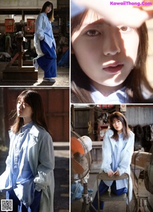 A woman in a blue shirt and blue pants standing in a warehouse.